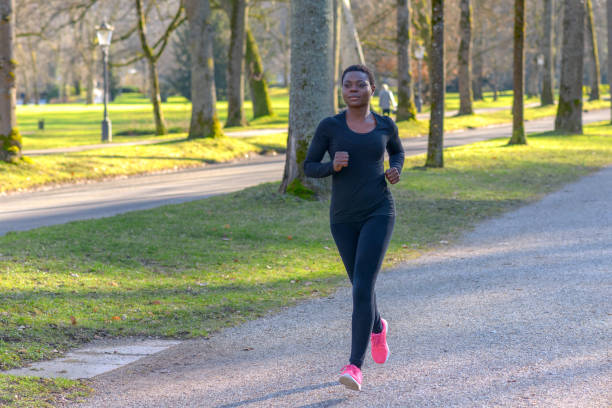 istock Athletic fit young African woman 1128620254