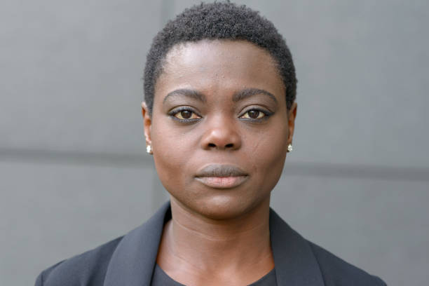 istock Front bust portrait of young black woman 1128620262
