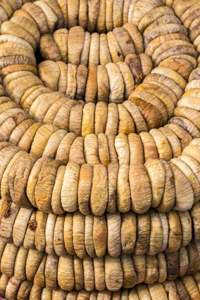 istock Dried organic figs background. Food concept photo. 1128622890