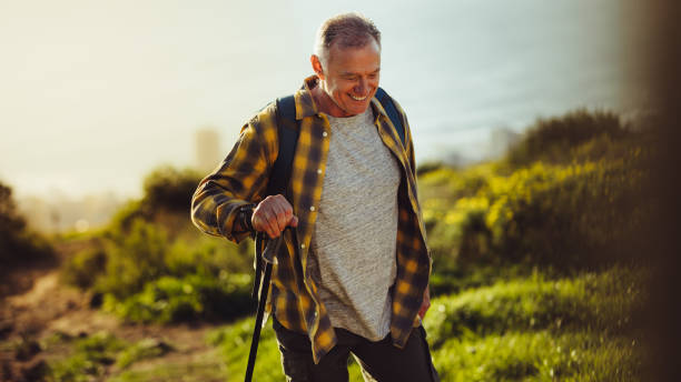 istock Senior man on a hiking trip 1128623489