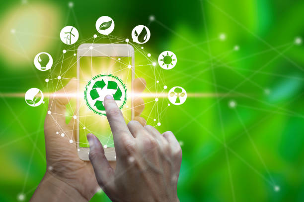 istock Hand use smartphone with environment icons over the Network connection 1128624262