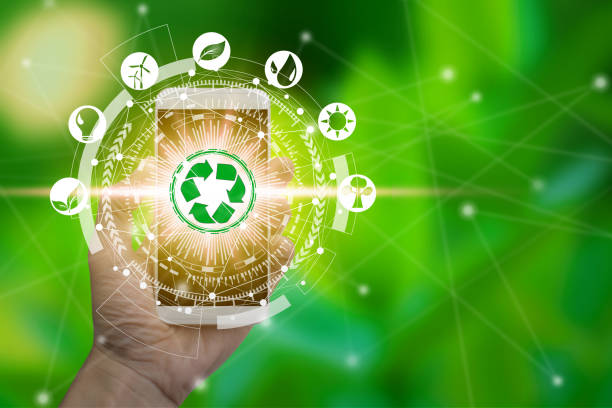 istock Hand use smartphone with environment icons over the Network connection 1128624274