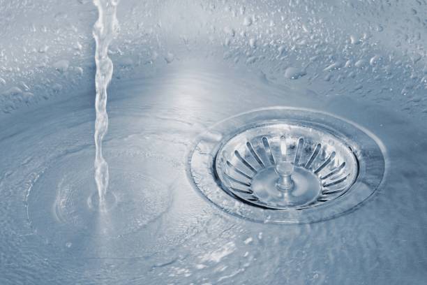 istock Water running into the sink 1128627185
