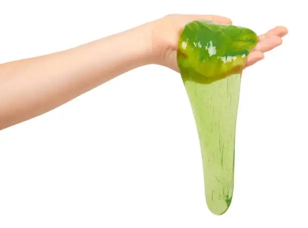 kid playing green slime with hand, transparent toy. Isolated on white background