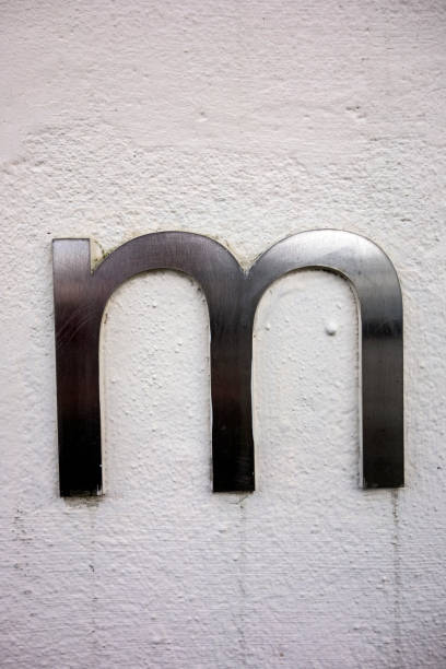 istock Written Wording in Distressed State Typography Found Letter M 1128630899