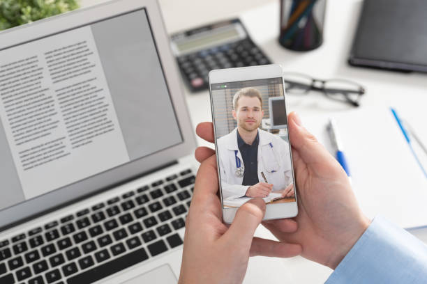 istock Doctor with a stethoscope. Telehealth conference. 1128633765