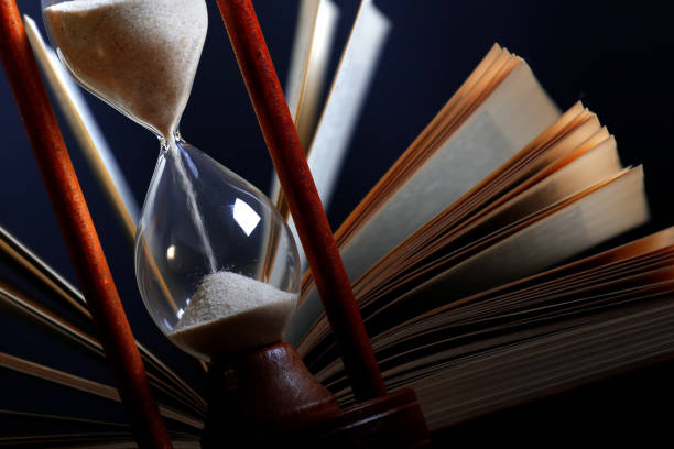 istock Book and an hourglass 1128634273