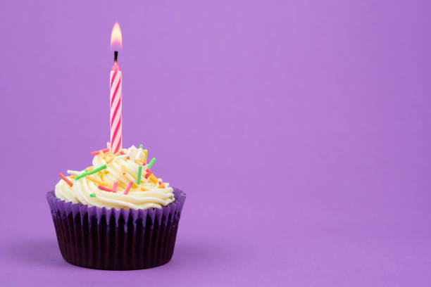 istock Birthday cake and candle 1128634752