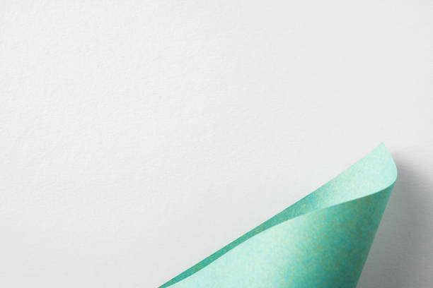 Design concept - green folded japanese washi paper on white background for mockup