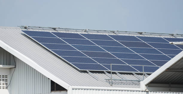 istock solar panels installed on the roof function to convert solar energy into electrical energy for use as renewable energy 1128636071