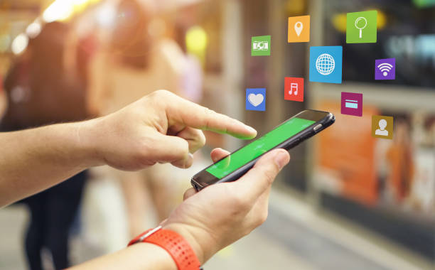 istock Young man waiting on station platform on background moving train using smart phone.with IOT, internet of things,smart city and network connect concept 1128636083