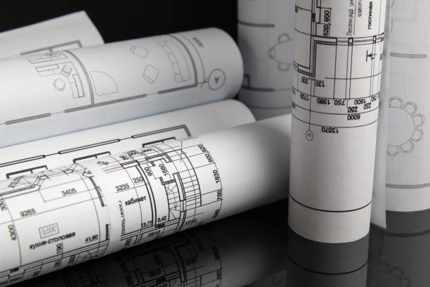 istock Paper architectural drawings and blueprint. Engineering blueprint 1128641136