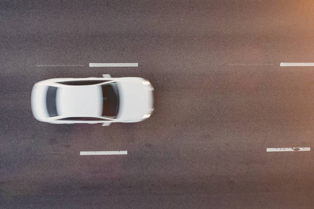 istock Top view of car on road 1128647171