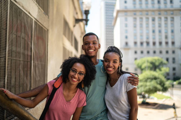 istock Young latinx group looking in the city portrait 1128648968