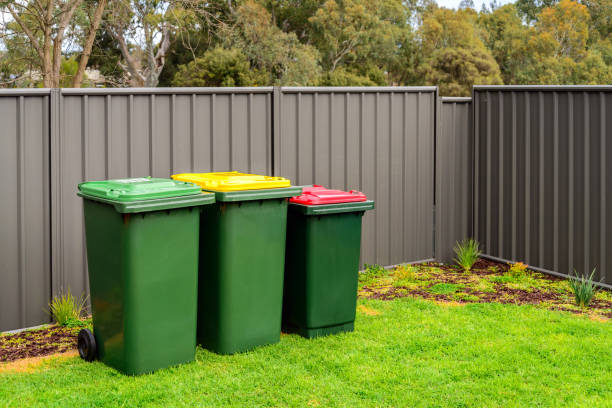 istock Australian home rubbish wheelie bins set on back yard 1128654877