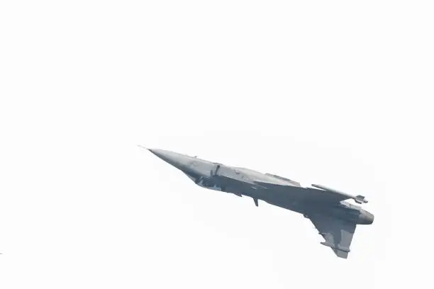 The Gripen plane above the horizon is a white background.