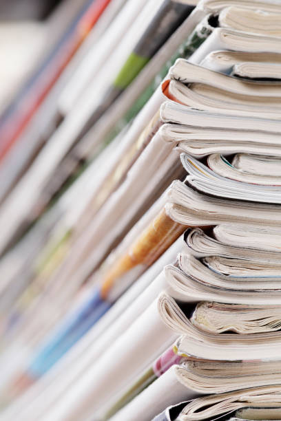 istock Close-up photograph of a stack of old magazines 1128656342