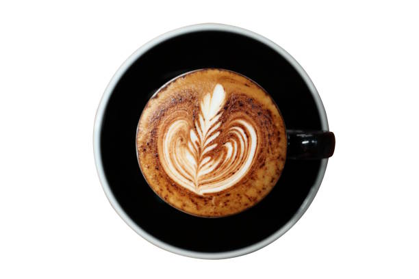 istock Hot cappuccino drink with latte art in black cup isolated on white background 1128657829