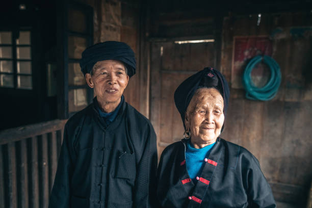 istock smiling old  chinese minority couple 1128658659