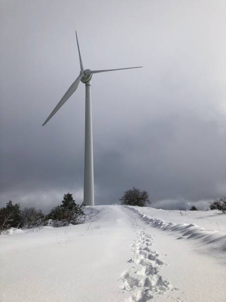 Wind turbine in winter. stock photo