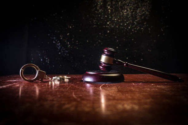 istock Document with judge on wooden table. Law theme. Selective focus 1128661871