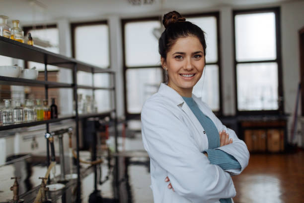 Portrait of smiling chemist Portrait of smiling chemist in laboratory biologist stock pictures, royalty-free photos & images