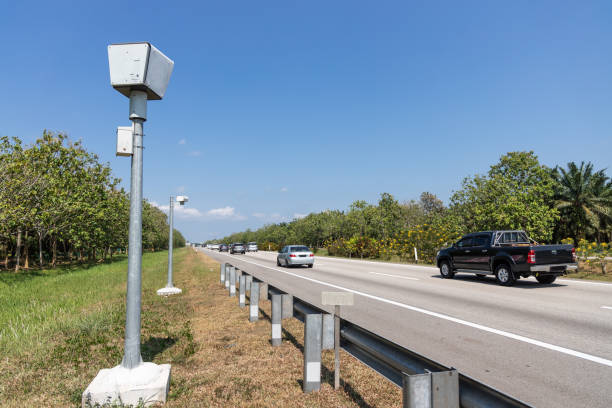 istock Speed trap surveillance camera along highway to control speeding 1128663492