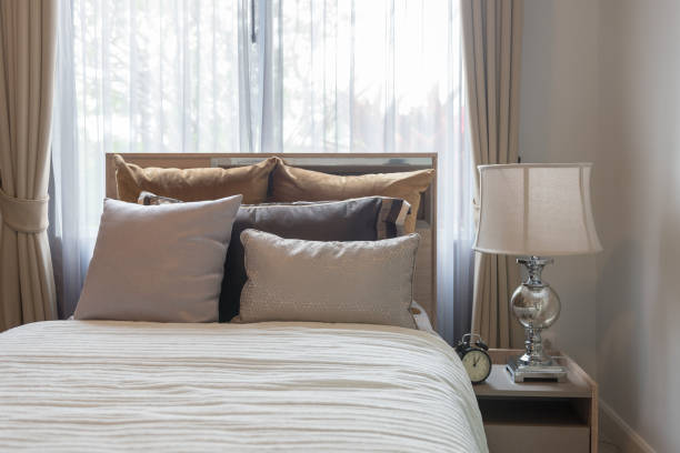 istock luxury bedroom with set of pillows 1128664355