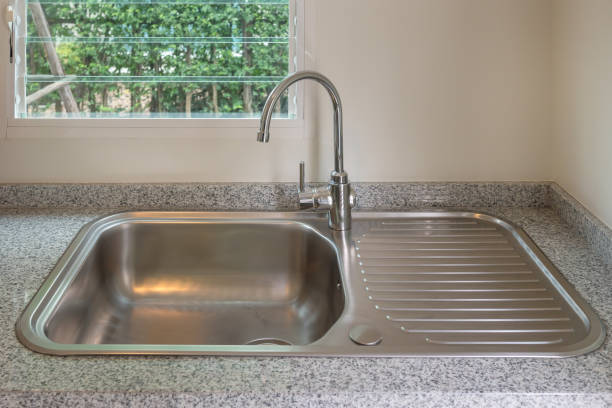 istock sink with faucet in kitchen room 1128664357