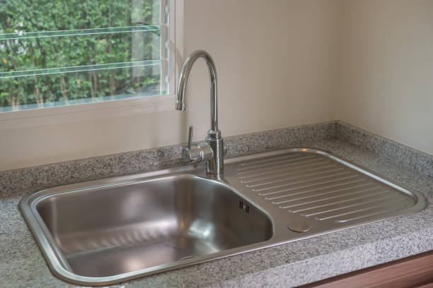istock sink with faucet in kitchen room 1128664358