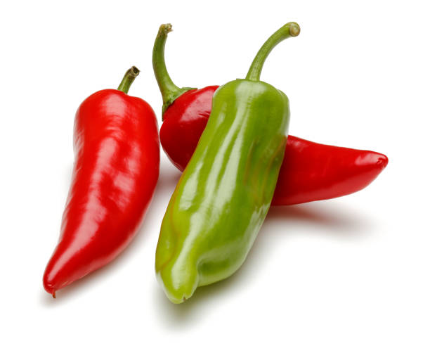 istock Fresh green and red pepper isolated on white 1128664508