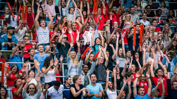 istock People on a stadium cheering their team 1128664605
