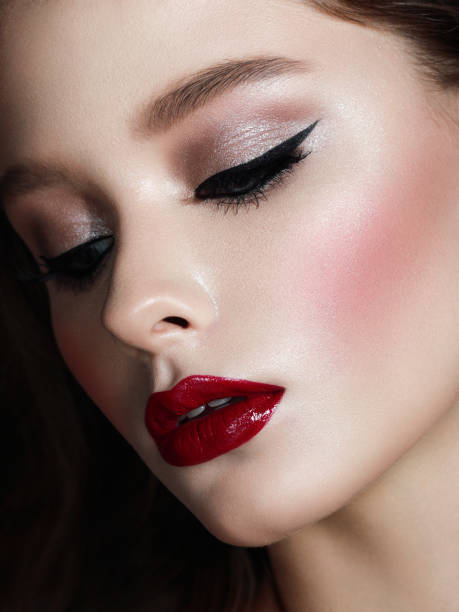 istock Beautiful woman with bright make-up 1128665825