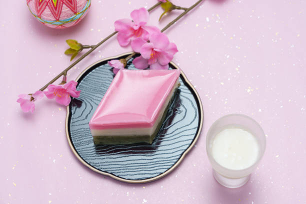 istock red, white, and green lozenge-shaped rice cakes and non-alcoholic rice drink (used for Japanese Girls' Festival) 1128665881