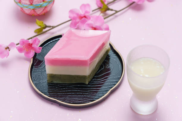 istock red, white, and green lozenge-shaped rice cakes and non-alcoholic rice drink (used for Japanese Girls' Festival) 1128665884