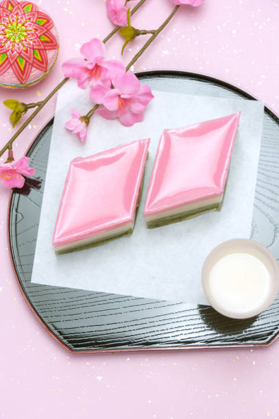 istock red, white, and green lozenge-shaped rice cakes and non-alcoholic rice drink (used for Japanese Girls' Festival) 1128665896