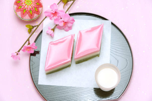 istock red, white, and green lozenge-shaped rice cakes and non-alcoholic rice drink (used for Japanese Girls' Festival) 1128665905