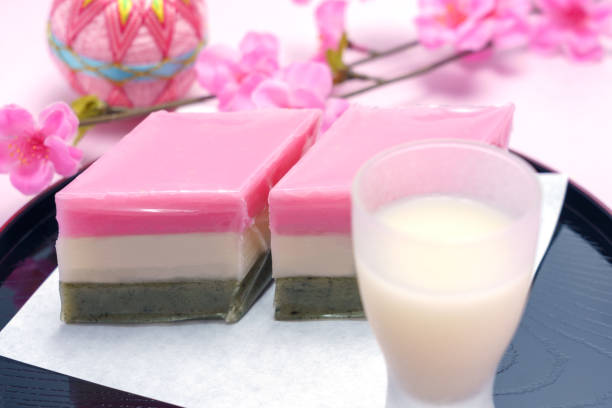istock red, white, and green lozenge-shaped rice cakes and non-alcoholic rice drink (used for Japanese Girls' Festival) 1128665910