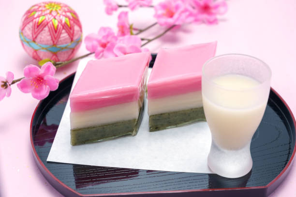 istock red, white, and green lozenge-shaped rice cakes and non-alcoholic rice drink (used for Japanese Girls' Festival) 1128665916