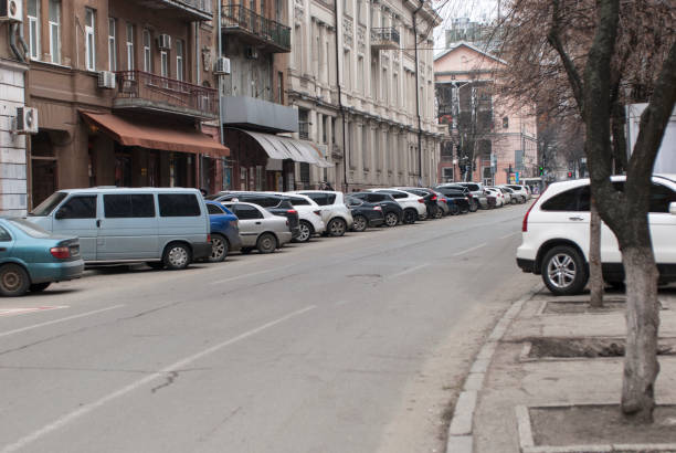 istock Many cars parking on the street. 1128667319