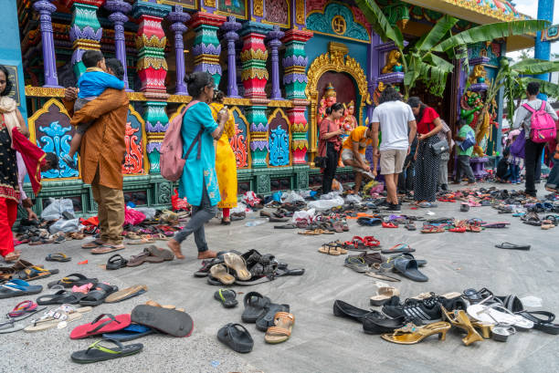 Kuala Lumpur, Malaysia. January 2019.    shoes left outside the temple at Batu Caves during the annual Thaipusam religious festival