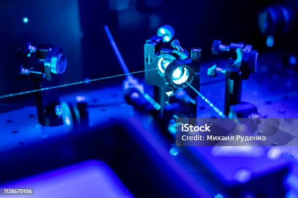 Laser Reflect On Optic Table Un Quantum Laboratory B Stock Photo - Download Image Now