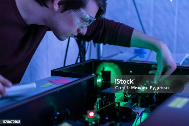 Scientist Work With Laser Machine Or System B Stock Photo - Download Image Now - Physics, Quantum, Laser