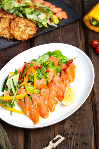 istock ceviche with fresh vegetables on a white plate 1128671051