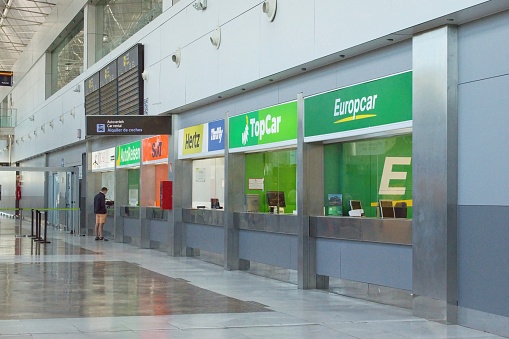 Tenerife South, International Airport, Canary Islands, Spain -11-28-2018 : Rental car offices counter inside airport terminal