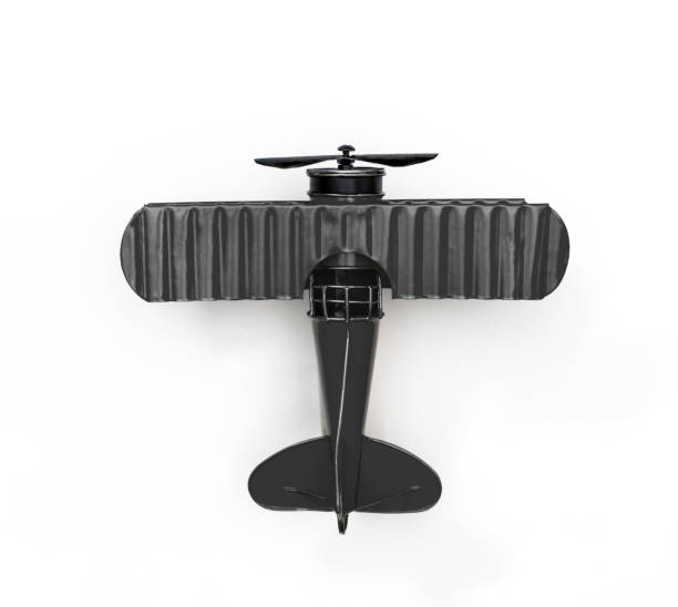 istock blue Metal toy plane isolated on white 1128671708