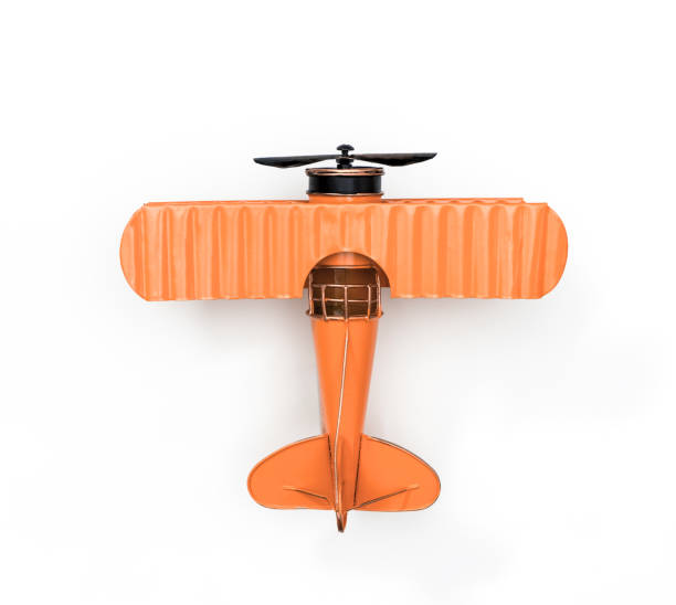istock blue Metal toy plane isolated on white 1128671845