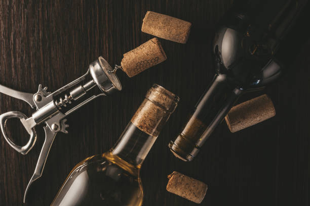 istock bottles of wine and corkscrew 1128673529