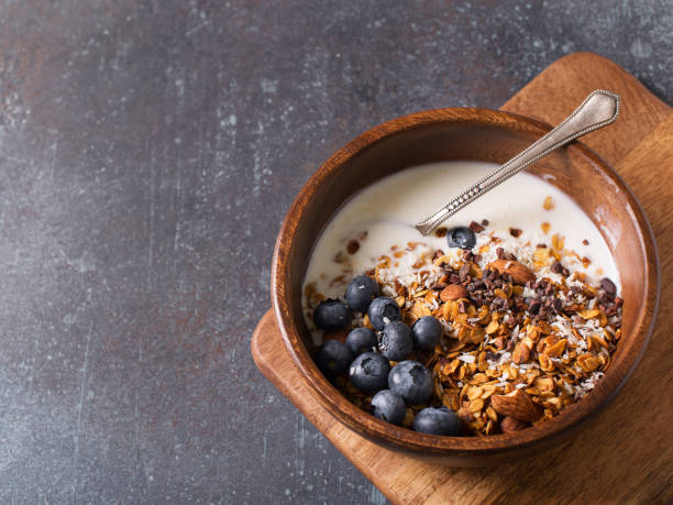 istock Homemade granola muesli with blueberries on dark grey 1128677007