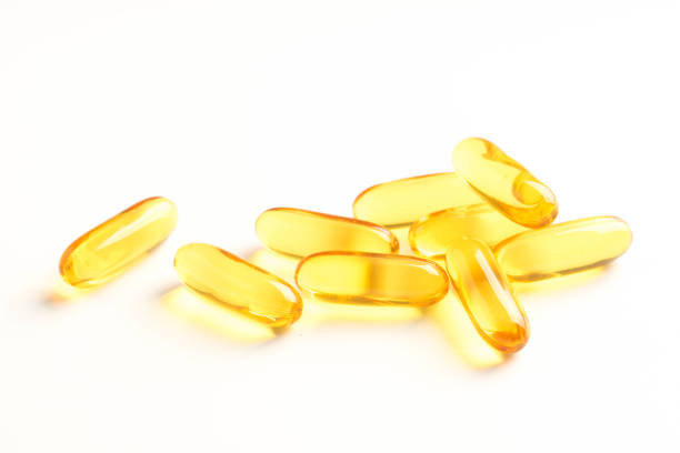 istock fish oil capsules isolated on white background 1128678517